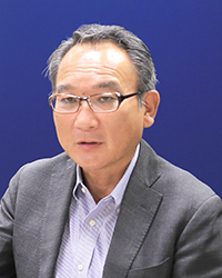 塚田 筍逸 氏